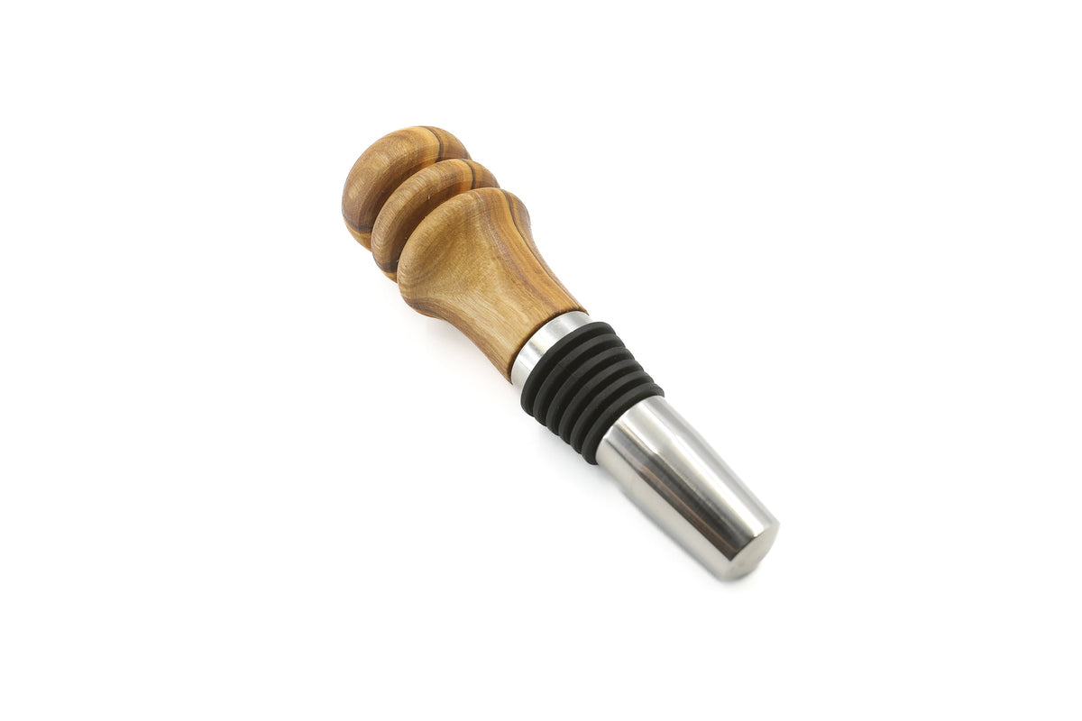 Handmade olive wood bottle stopper, included in the aperitif gift set