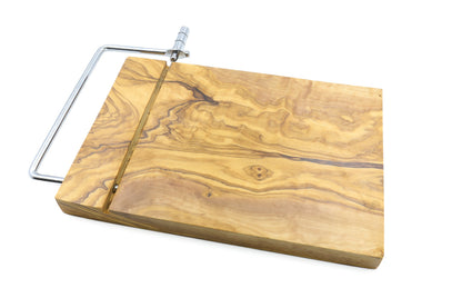 Close-up of the handcrafted olive wood cheese slicer
