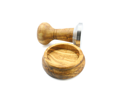Olive wood and stainless steel espresso accessory, including a tamper with a holder