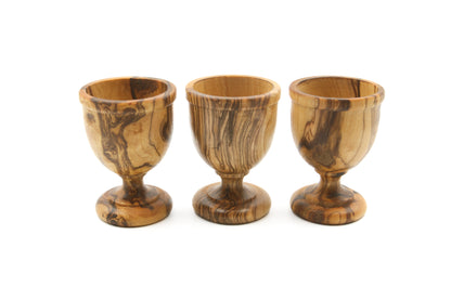 Olive wood egg cup with a rustic and natural appeal