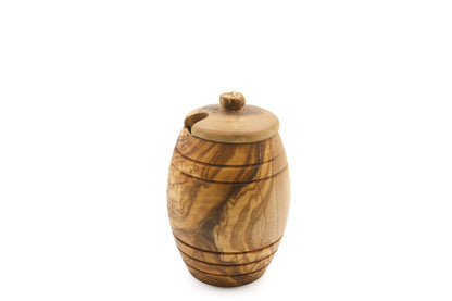Olive wood honey jar with a classic design, complete with a lid and dipping stick