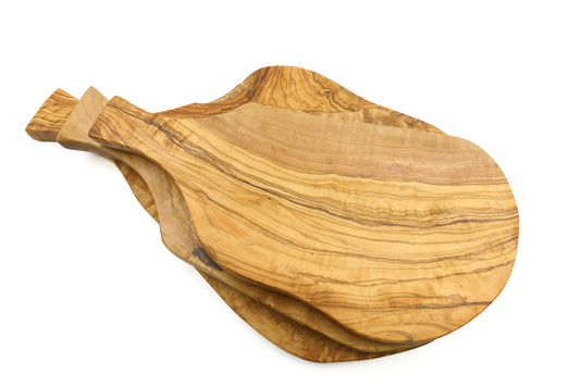 Handcrafted olive wood cutting board with an irregular, beef thigh-inspired shape and handle