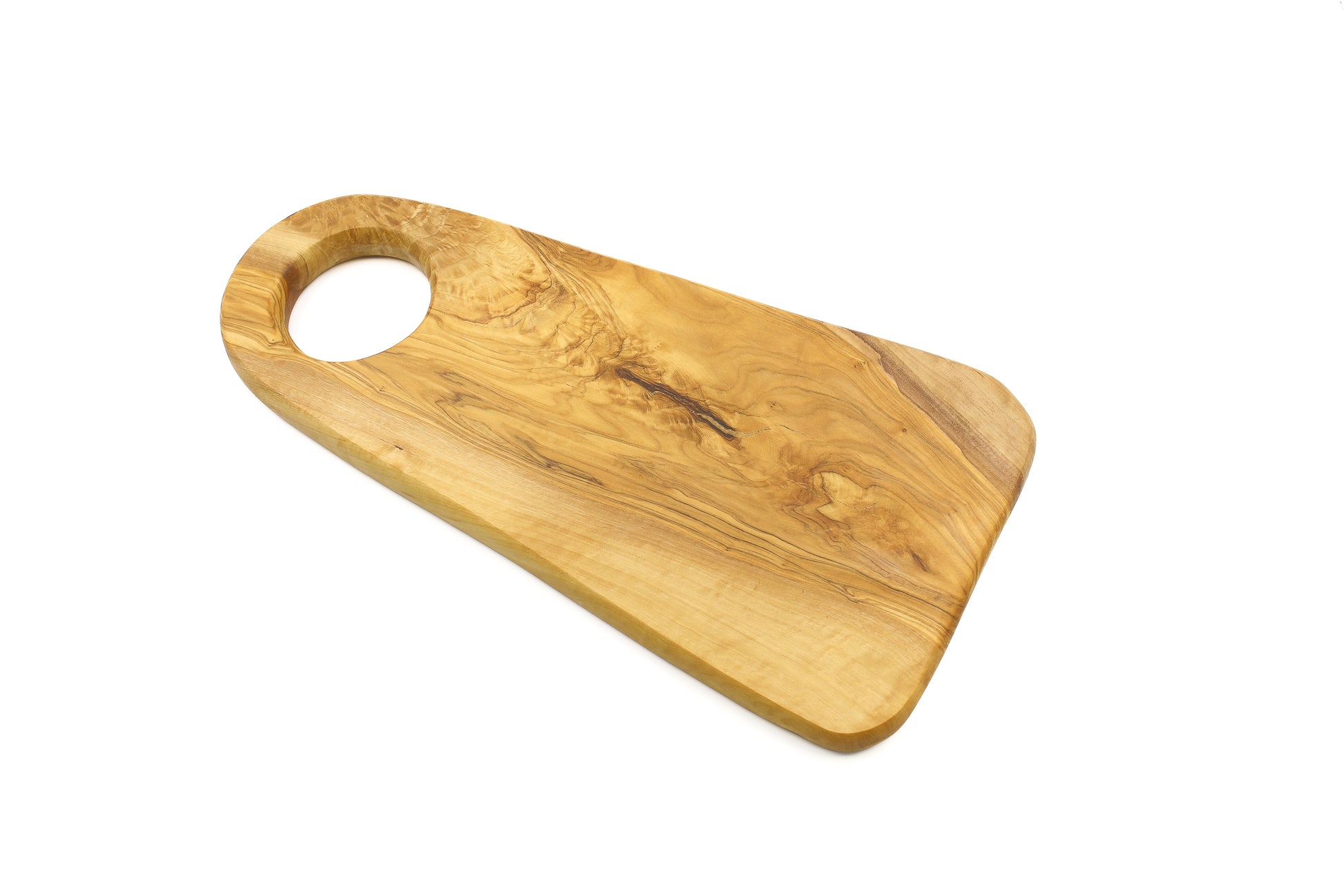 Fashionable oval serving board crafted from olive wood, elegant display