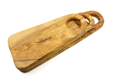 Fashion-forward oval olive wood serving board, perfect for displaying items