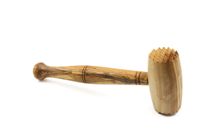 Olive wood tool for tenderizing your favorite cuts