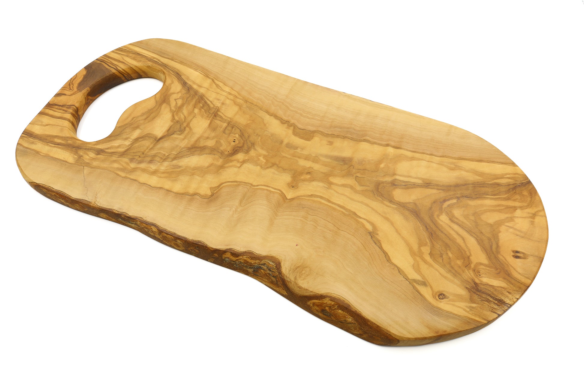 Rustic olive wood cutting board with an organic, hand-friendly shape