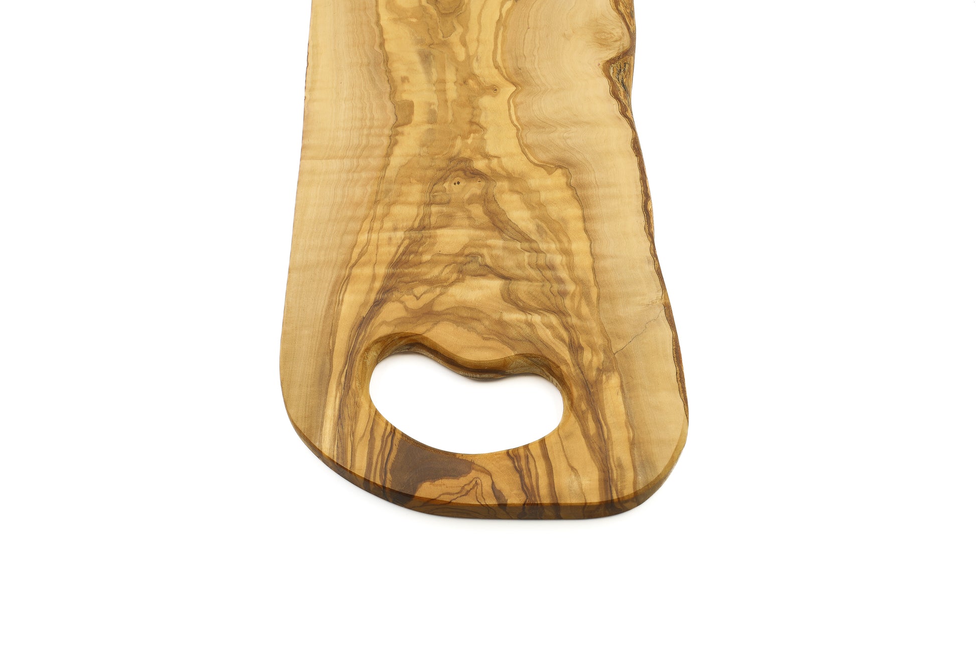 Hand-shaped olive wood cutting board with an in-hand handle for easy use