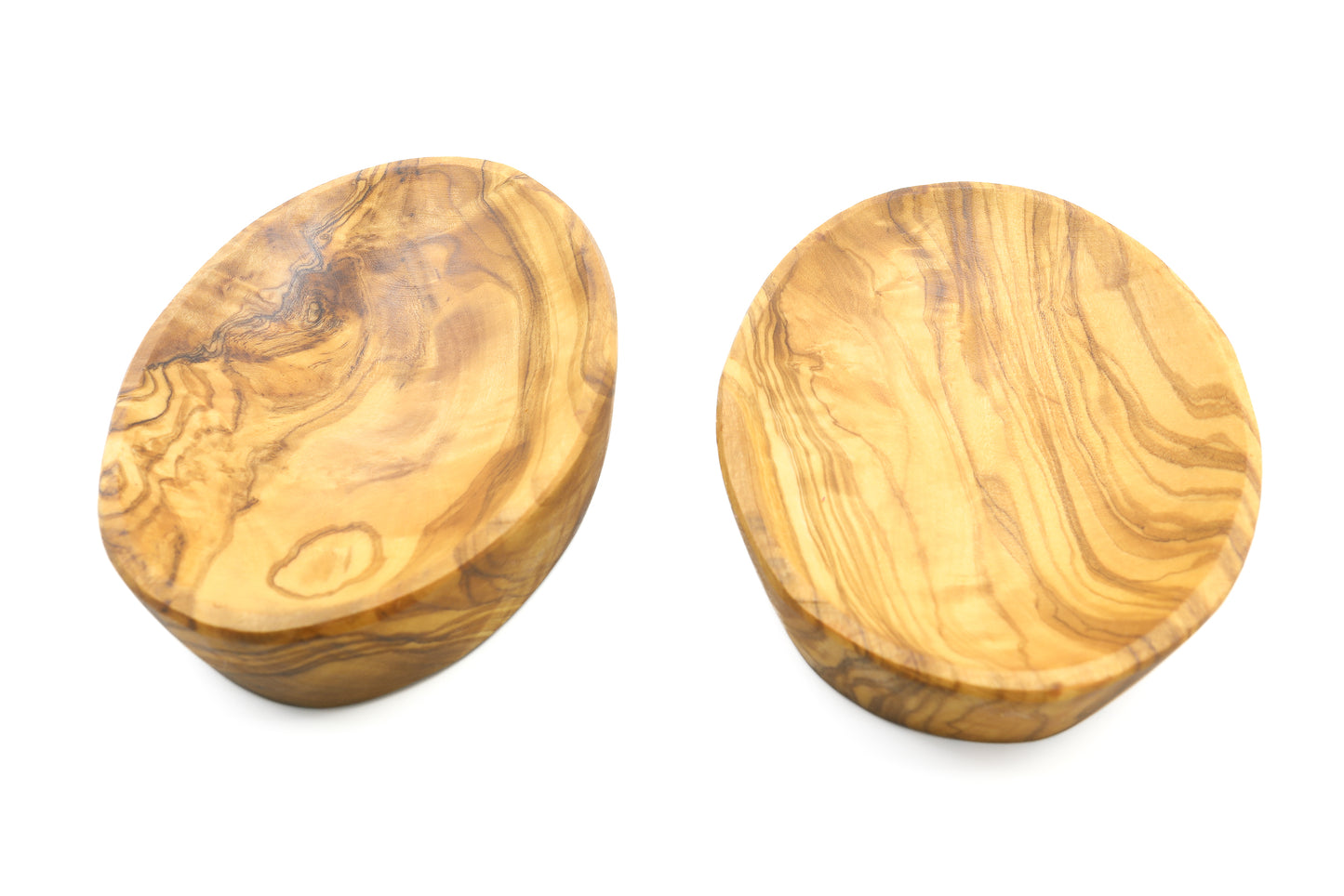 Olive wood oval bowl paired with an artisanal olive picker set