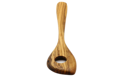 Olive wood stirring and mixing spoon, including a central hole for versatility