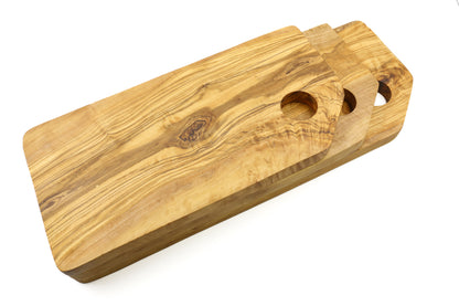 Beveled-edge olive wood chopping board in a rectangular shape