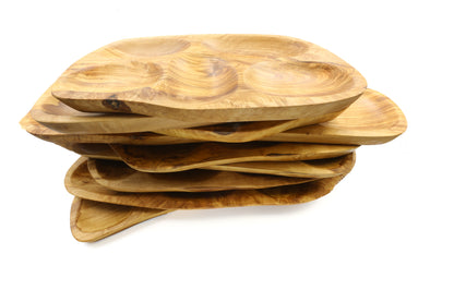 Olive wood appetizer tray with a distinctive irregular design