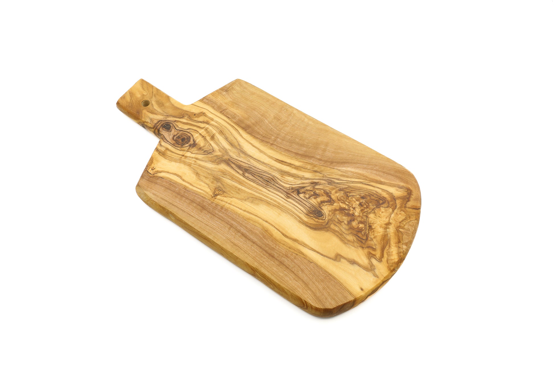 Olive wood serving board designed in a shield shape with a handle