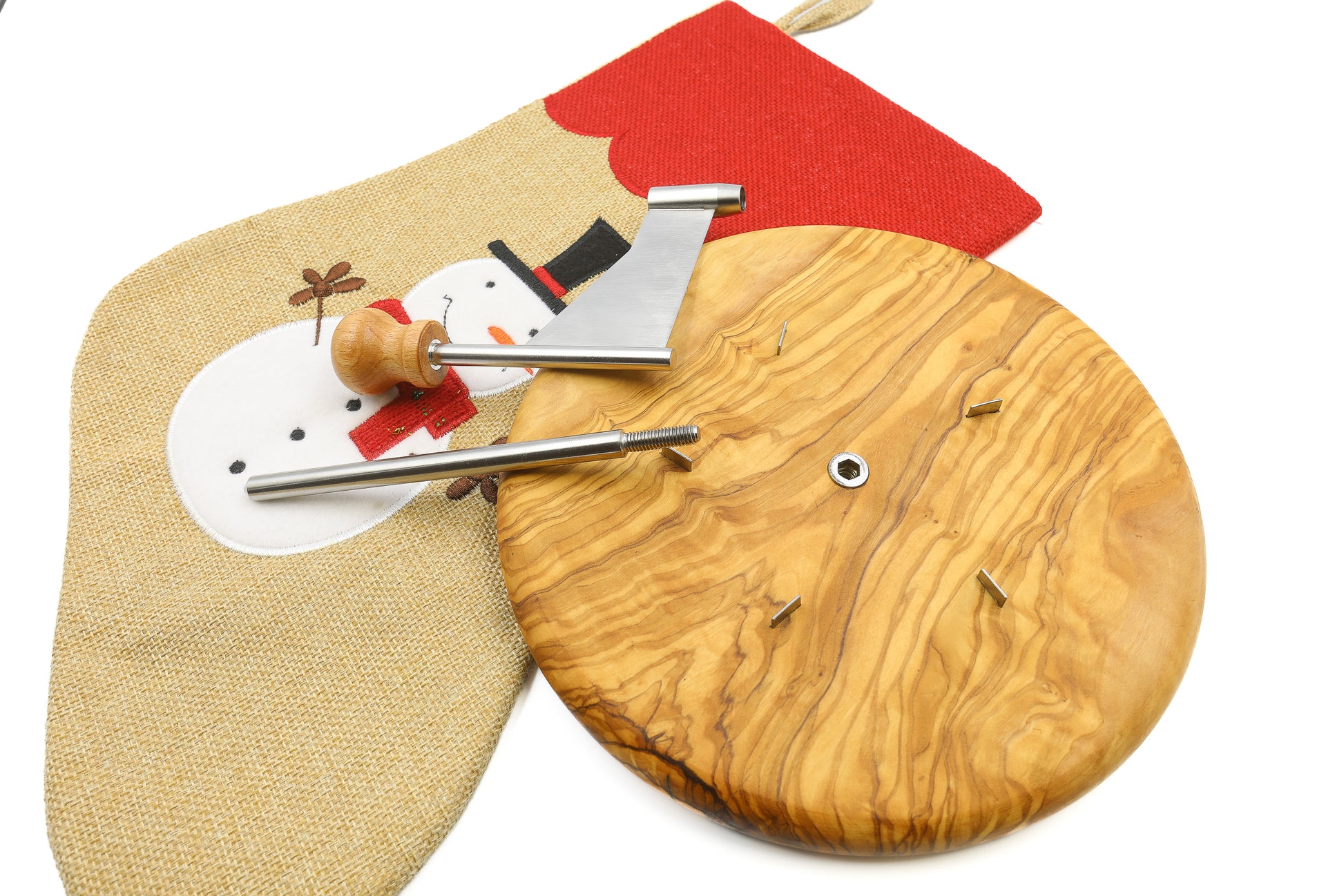 Rustic olive wood cheese board with a stainless steel platter and cheese shaver, perfect for your cheese selection