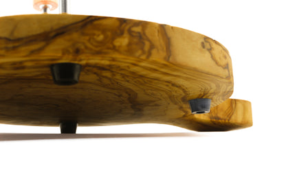 Olive wood cheese board designed with elegance, accompanied by a stainless steel platter and cheese shaver